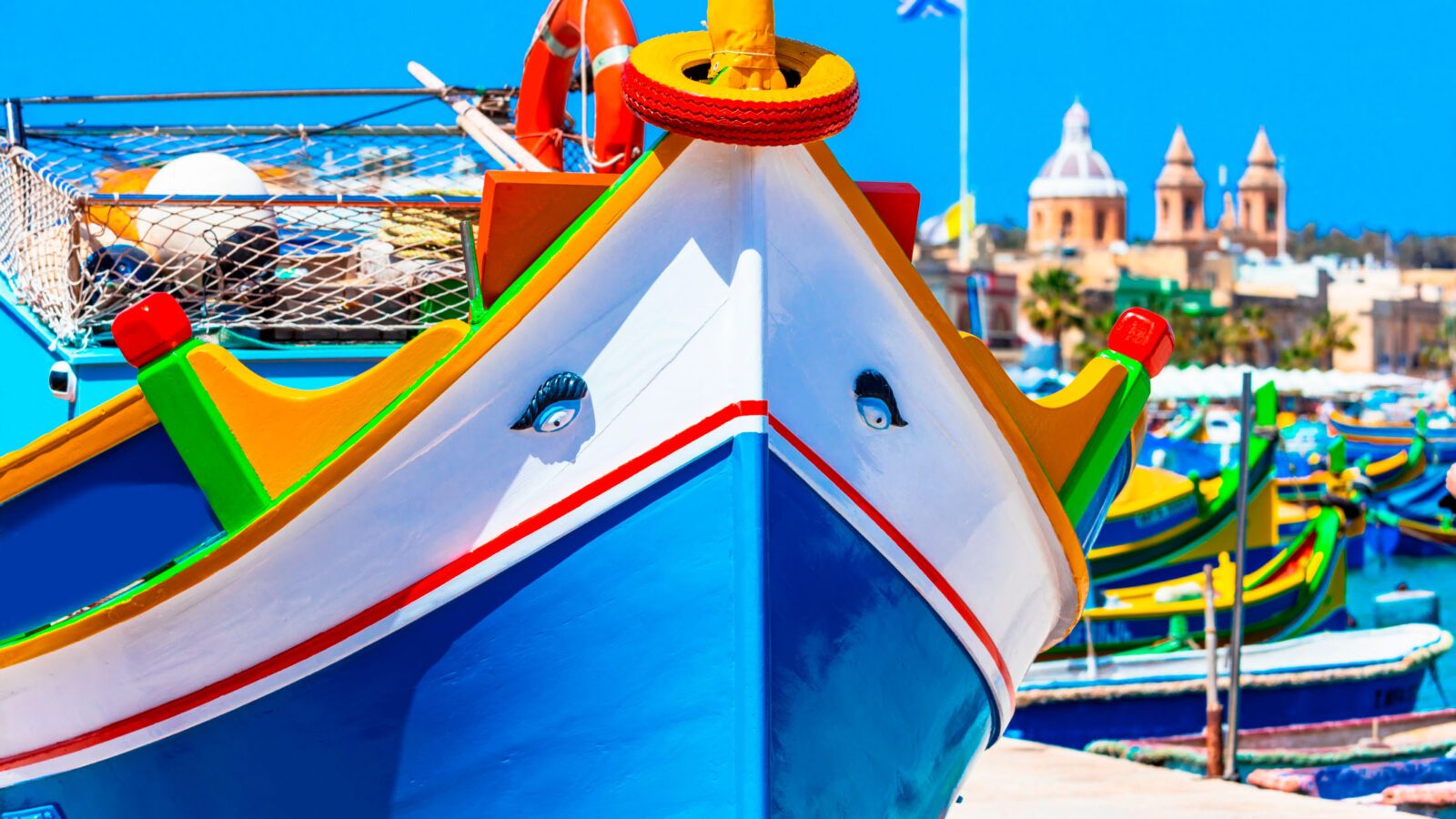 traditional colorful fishing boats luzzu un Malta