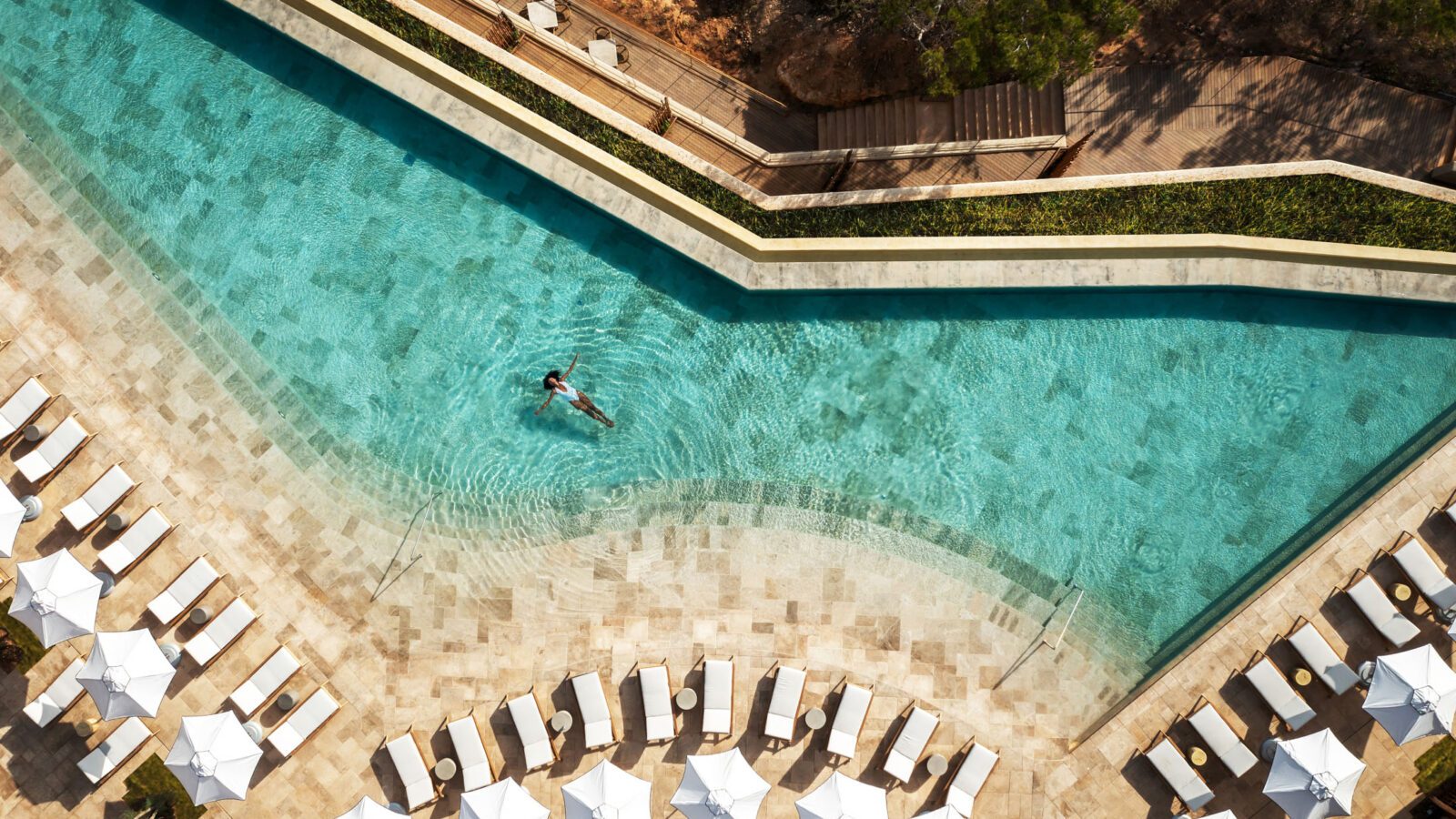 woman-floating-in-pool